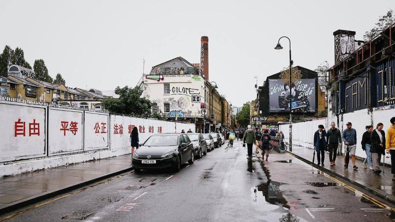 War of words over China breaks out on London wall in Brick Lane