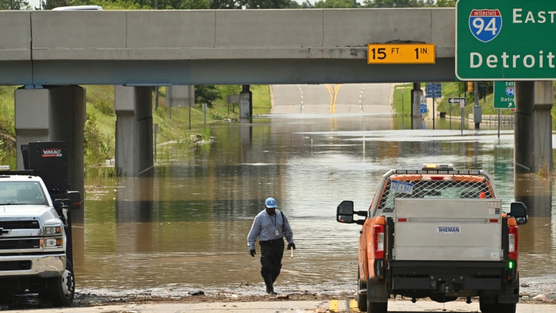 Flooding fills tunnels leading to Detroit airport, forces water rescues in Ohio and Las Vegas