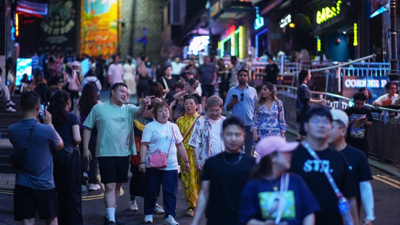 Hong Kong’s Lan Kwai Fong thronged on one of biggest party nights of year