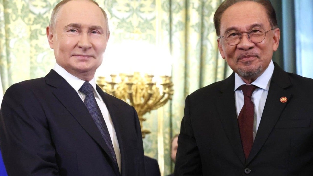 Putin’s ‘second wife’ joke about Malaysia’s Anwar draws laughs and anger amid MH17 ruling