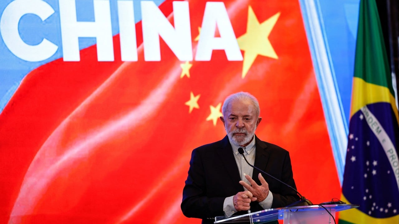 China, US sign duelling deals after agreeing to trade war truce