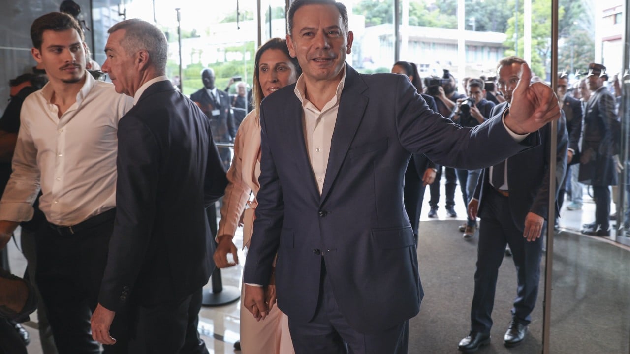 Portuguese PM’s party claims election win, falls short of majority