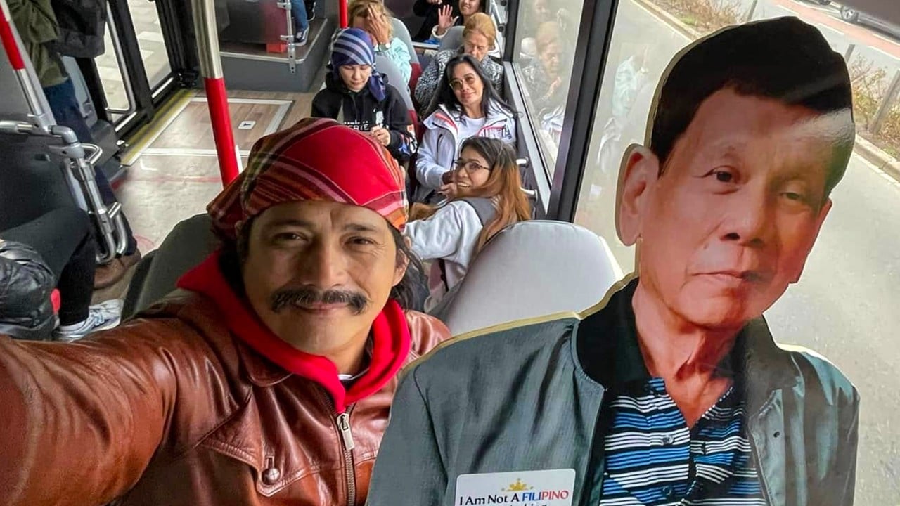 Why Duterte’s diehard fans are carrying cardboard cut-outs around The Hague