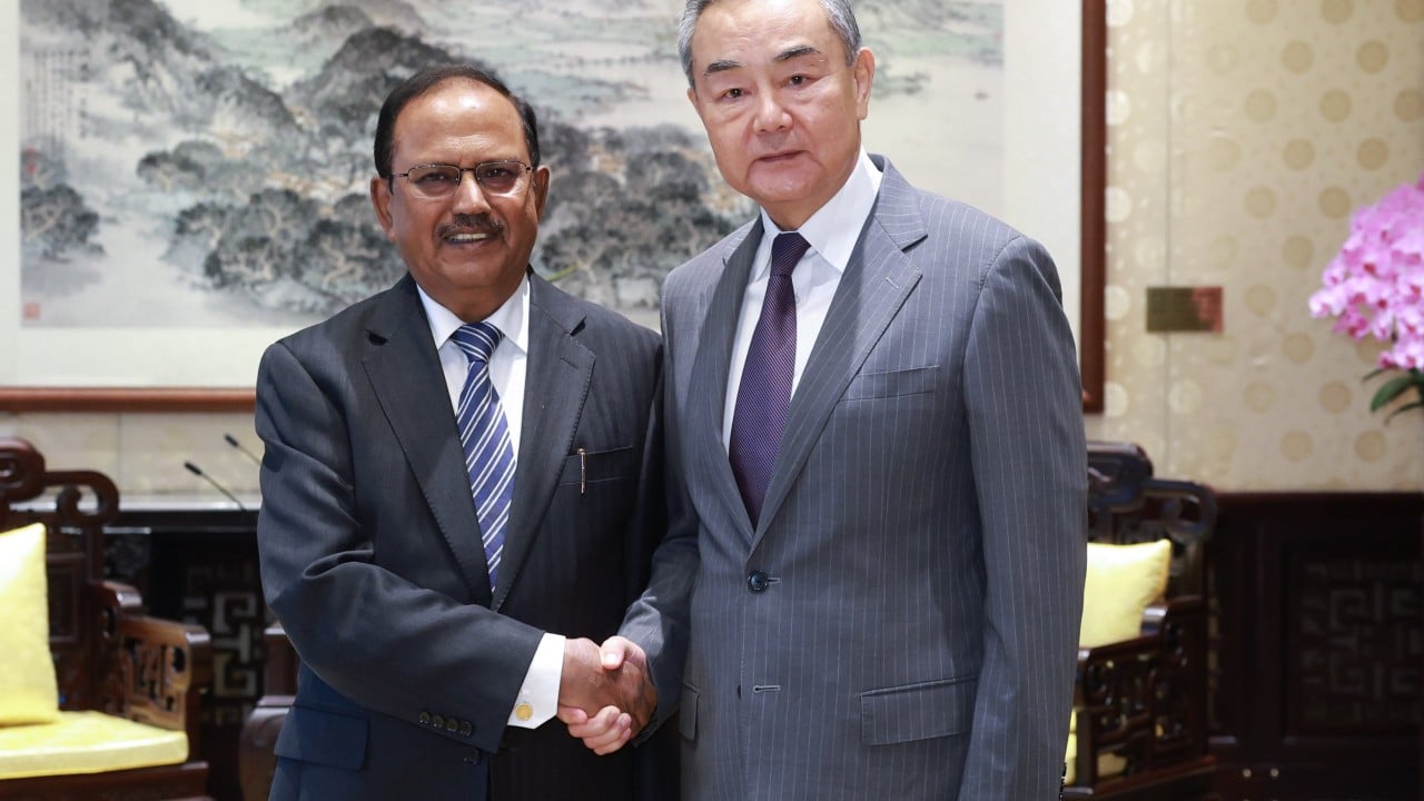 China, India agree to keep working on improving ties in high-level meeting
