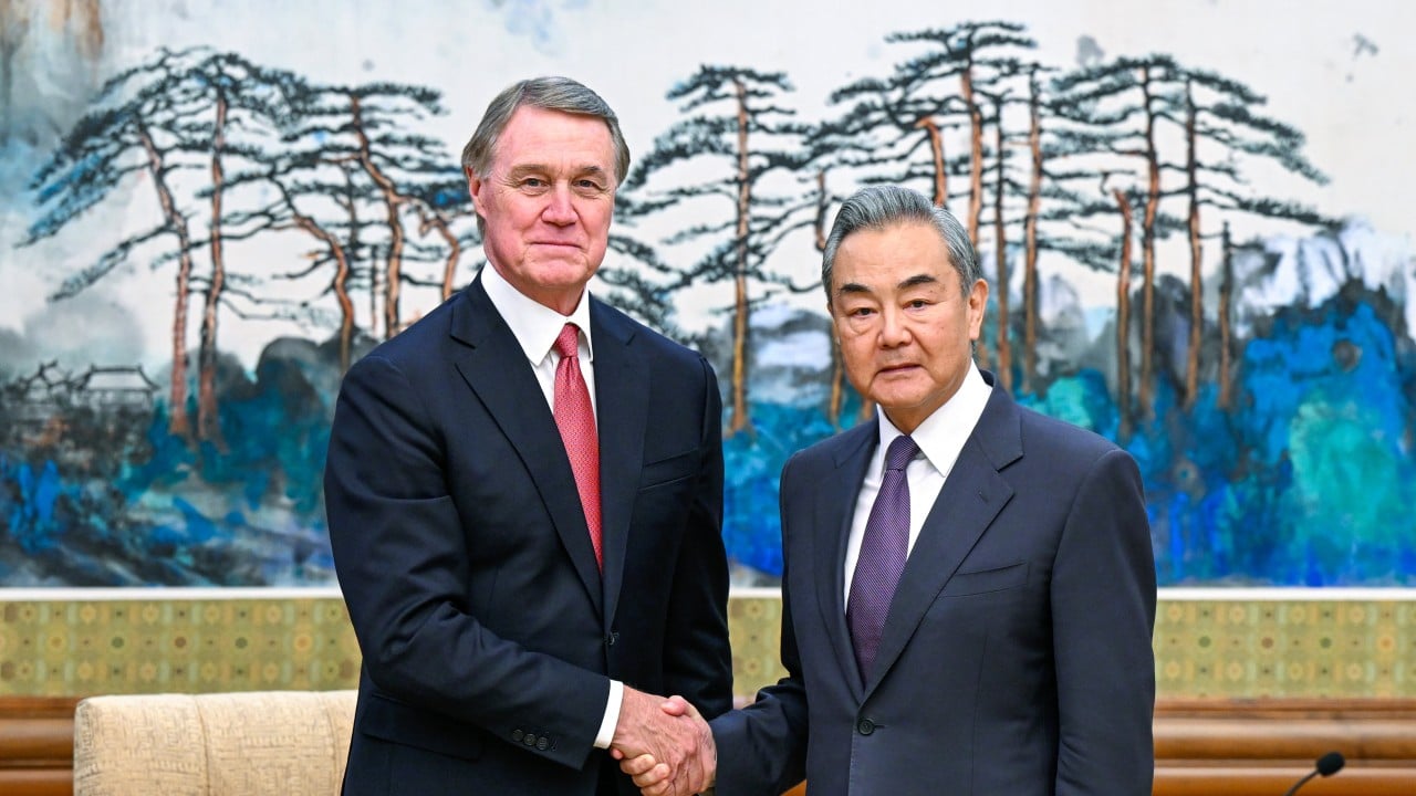 Chinese FM urges US to get ties back on track in meeting with envoy David Perdue