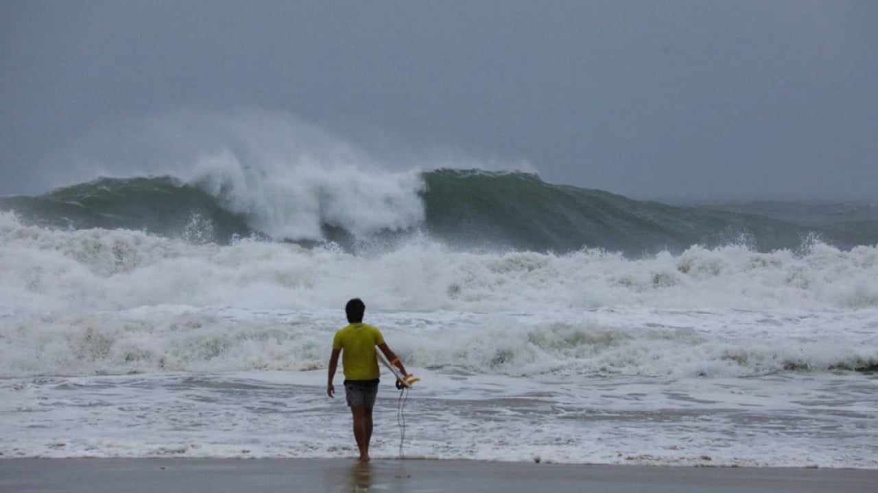 Hong Kong surfing coach slammed after claiming he’s riding waves during Typhoon Wipha