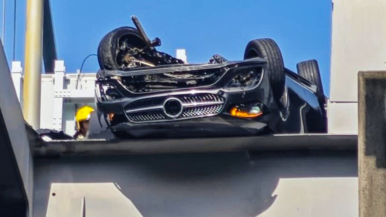 Driver escapes injury after Mercedes flips over on Hong Kong’s Tsing Ma Bridge