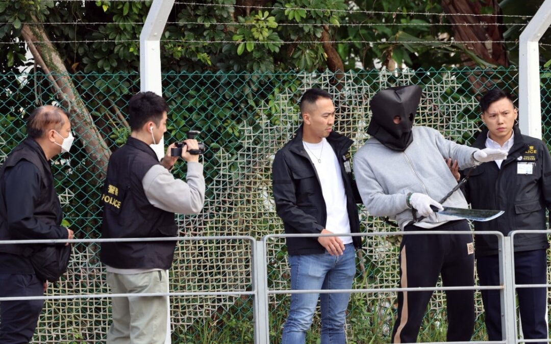 2 men linked to fatal attack on suspected triad member sent back to Hong Kong