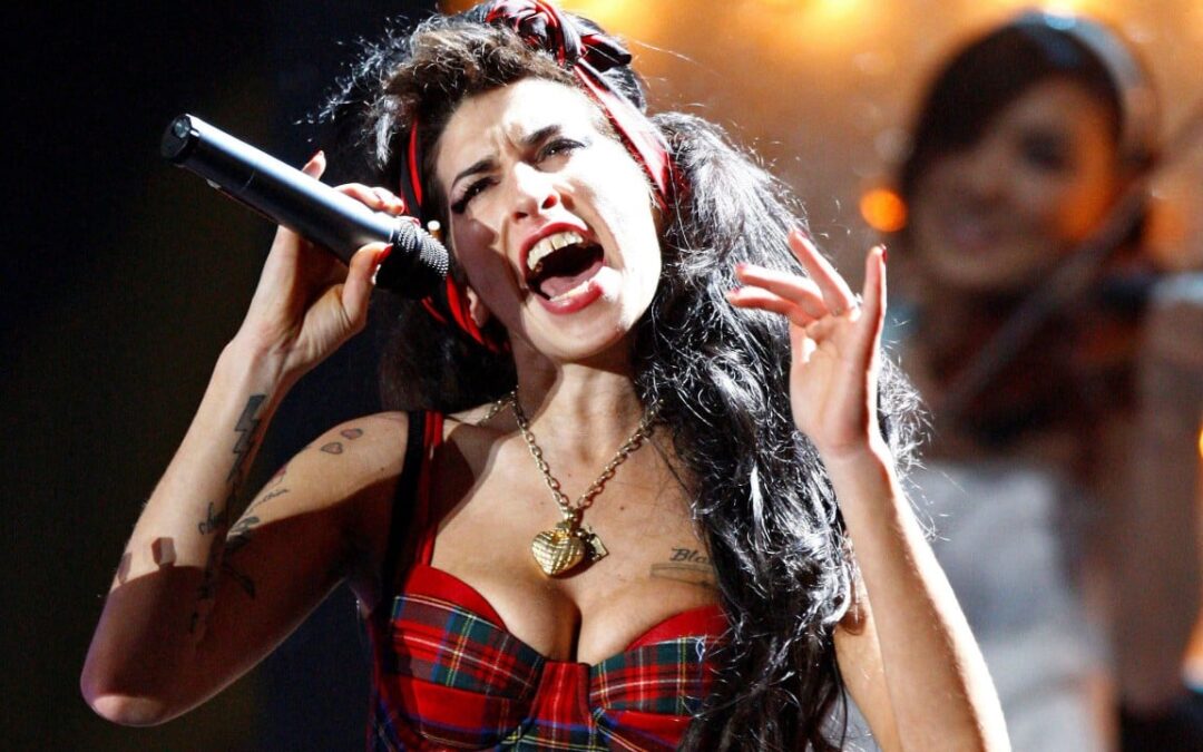 Amy Winehouse’s dad sues star’s friends for selling her clothes for US$970,000