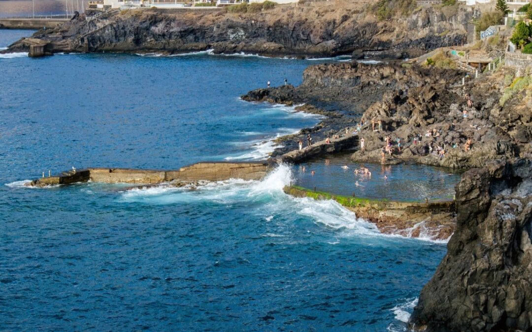 Powerful wave at Spanish tourist island sweeps swimmers to sea, killing 4