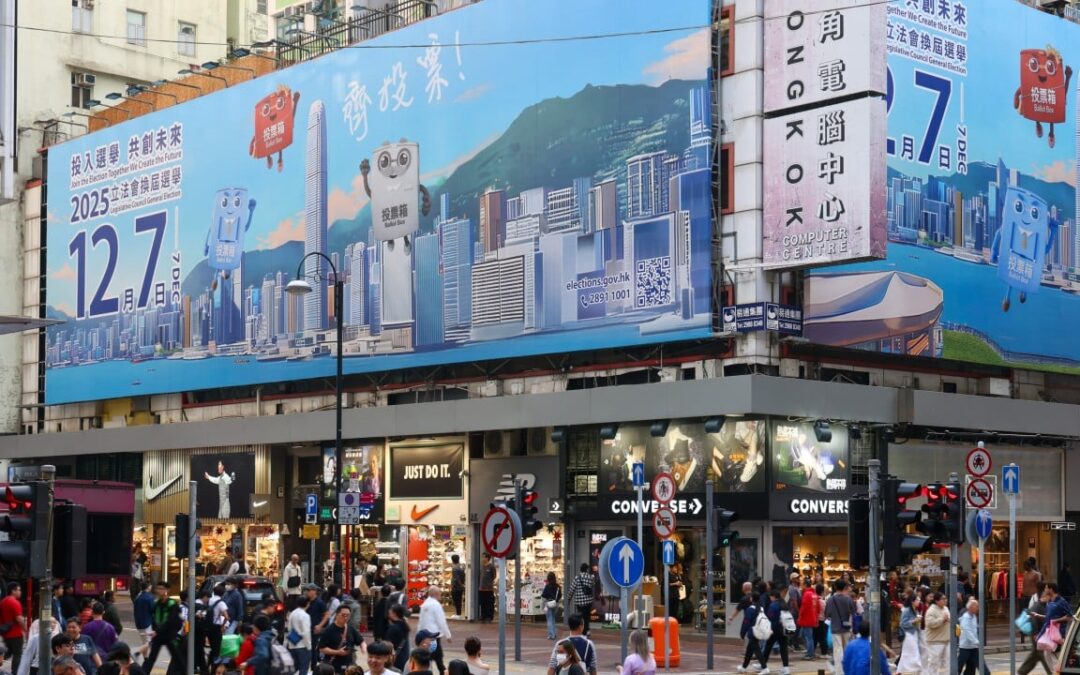 Legco election hopefuls scale back campaigning in Hong Kong fire aftermath