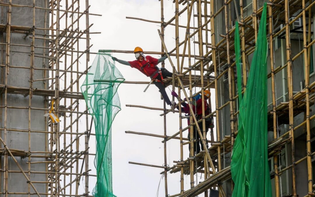 Hong Kong contractors race to remove scaffolding nets after Tai Po fire