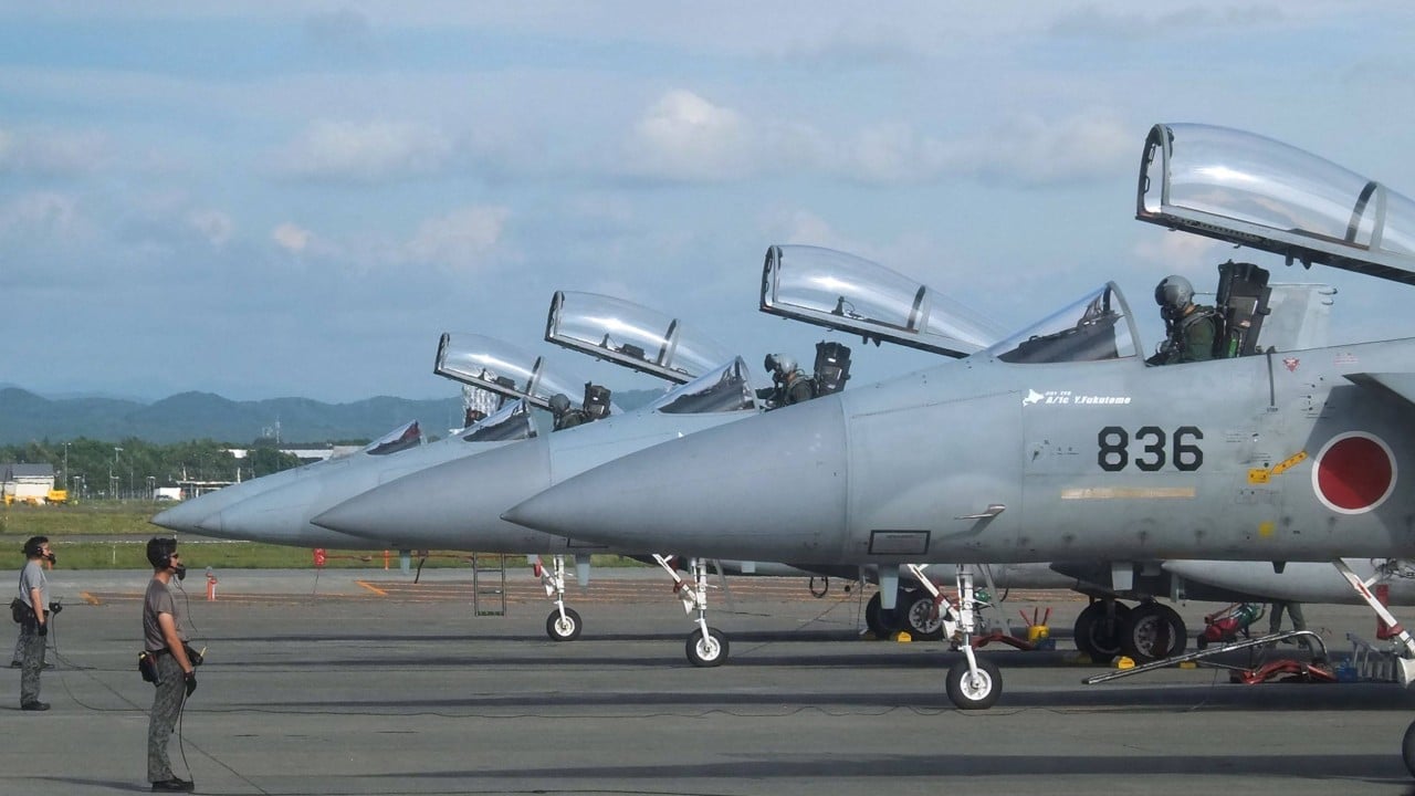 Mid-air military stand-off triggers duelling protests in China-Japan row latest