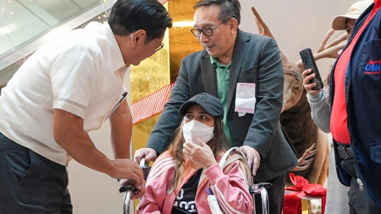 Philippines’ Marcos lauds helper returning home after deadly Hong Kong fire