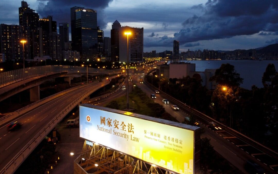 Woman, 26, arrested as Hong Kong expands crackdown on military-style drills