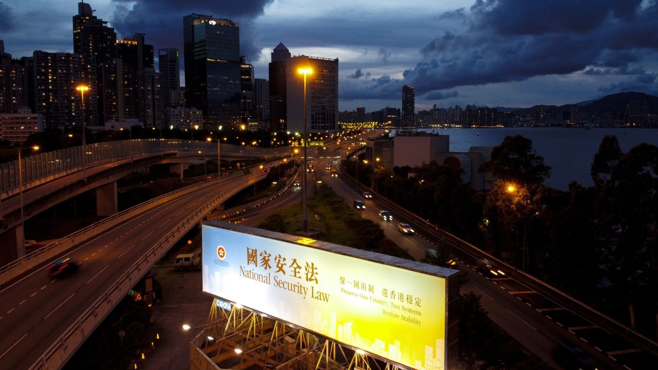 Woman, 26, arrested as Hong Kong expands crackdown on military-style drills