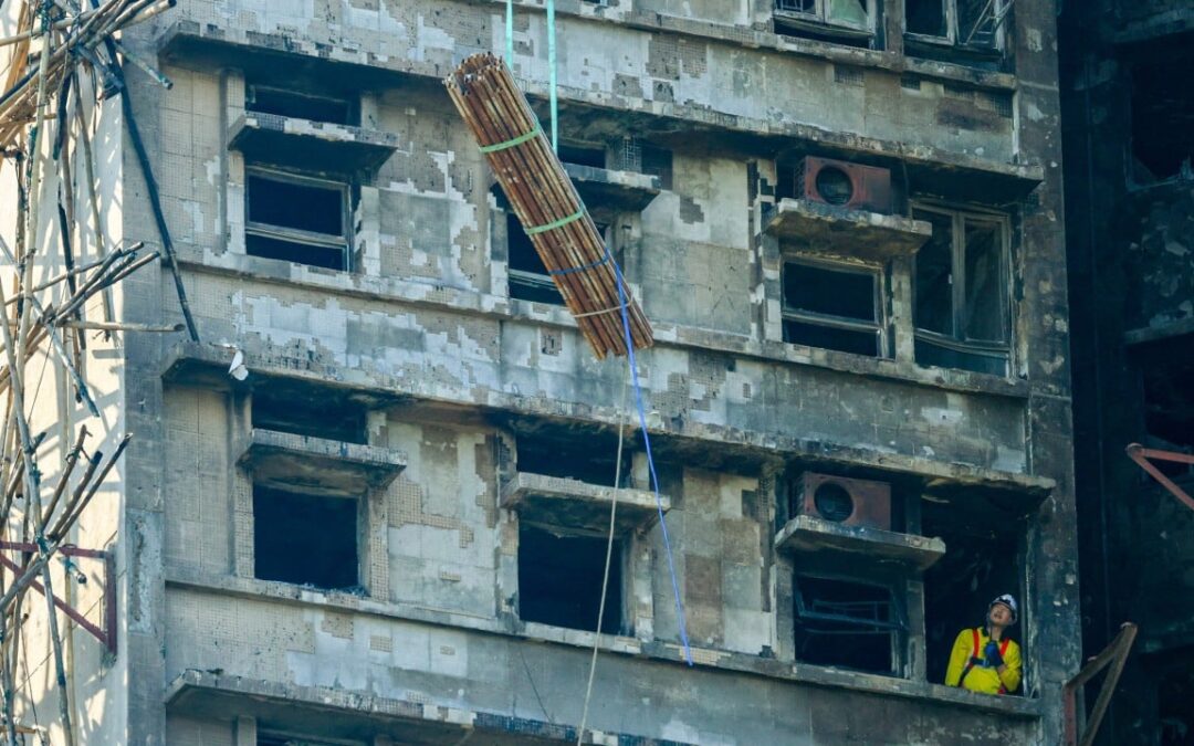 Steel bars brought in to strengthen building ravaged in Hong Kong’s Tai Po blaze