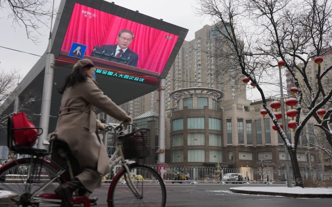 China targets lowest growth range since 1991 in realistic move as pressures rise