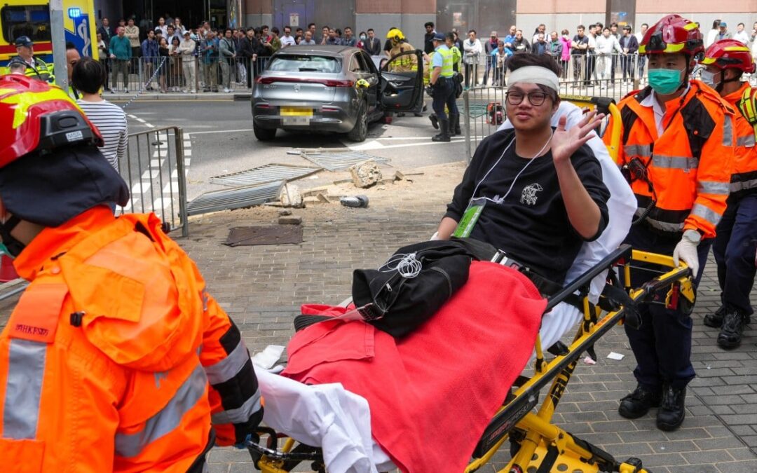 9 injured as car mounts pavement in Hong Kong