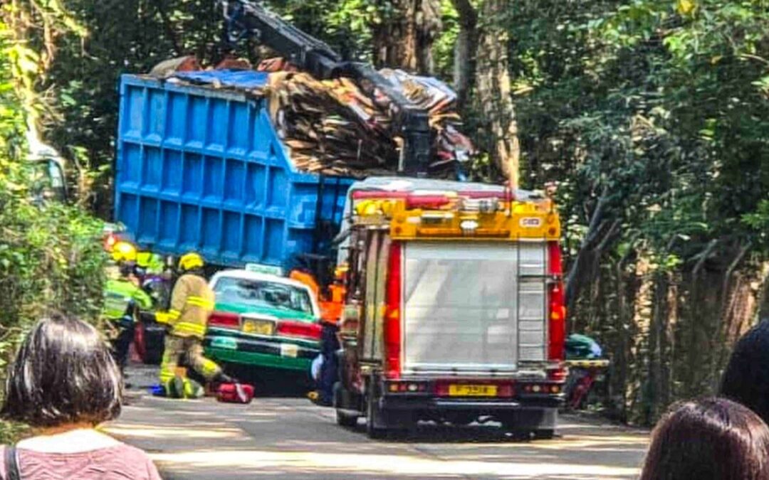 Hong Kong truck driver arrested after crash kills cabby and passenger