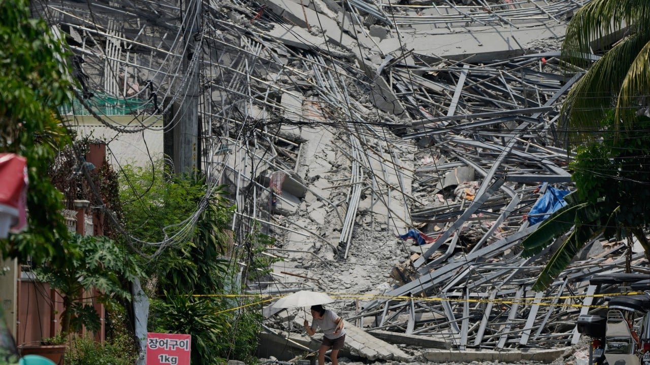 Philippine rescuers race to free workers trapped after hotel collapse