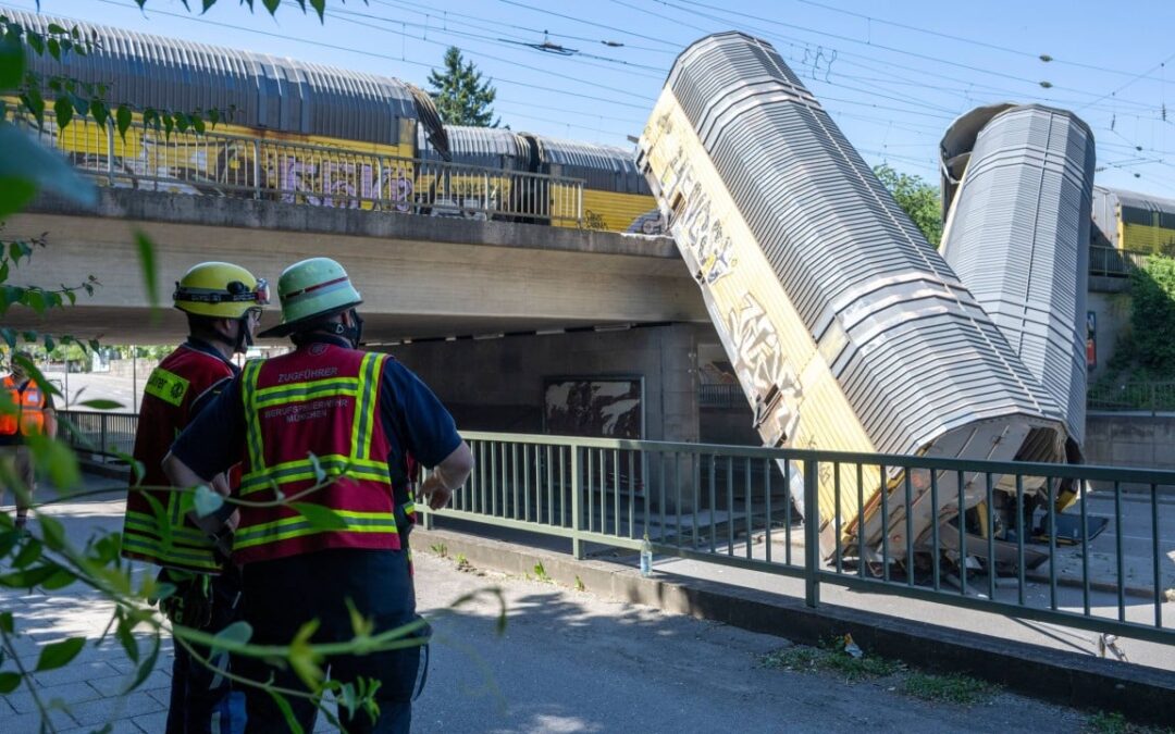 1 killed as freight train plunges from bridge in Germany after crash