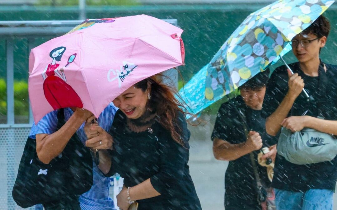 Hong Kong issues amber rainstorm warning as thundery showers lash city