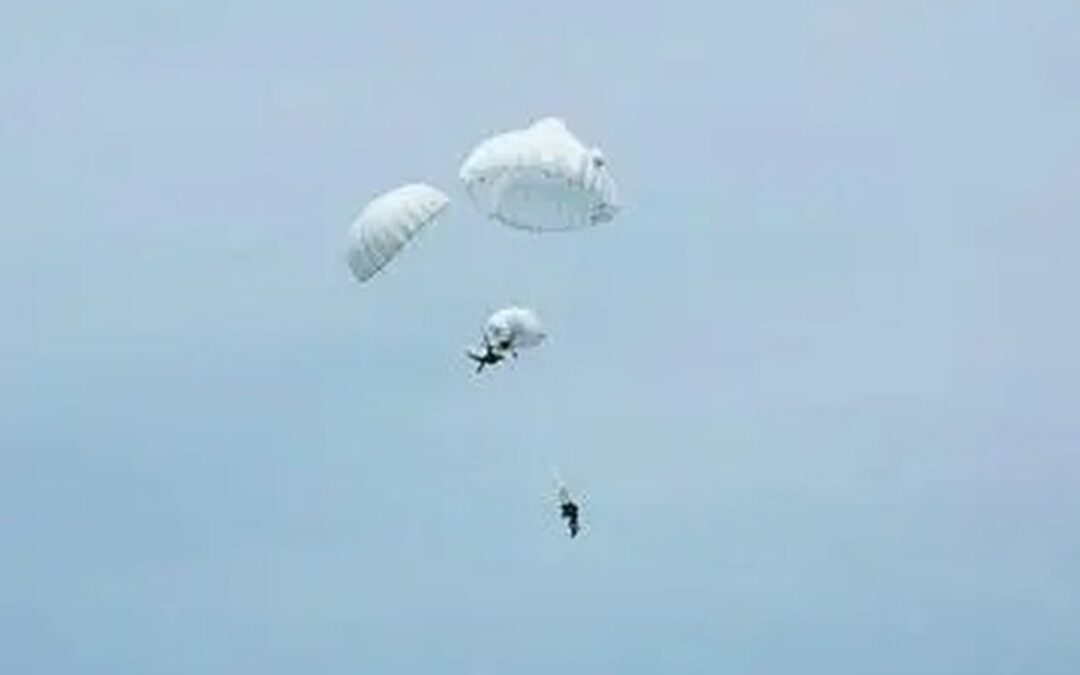 Chinese paratrooper saves unconscious comrade in dramatic mid-air chute emergency
