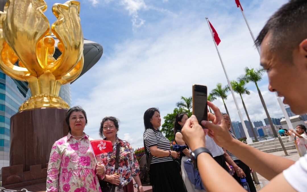 Mainland Chinese tourists pack landmarks as Hong Kong marks 29th anniversary
