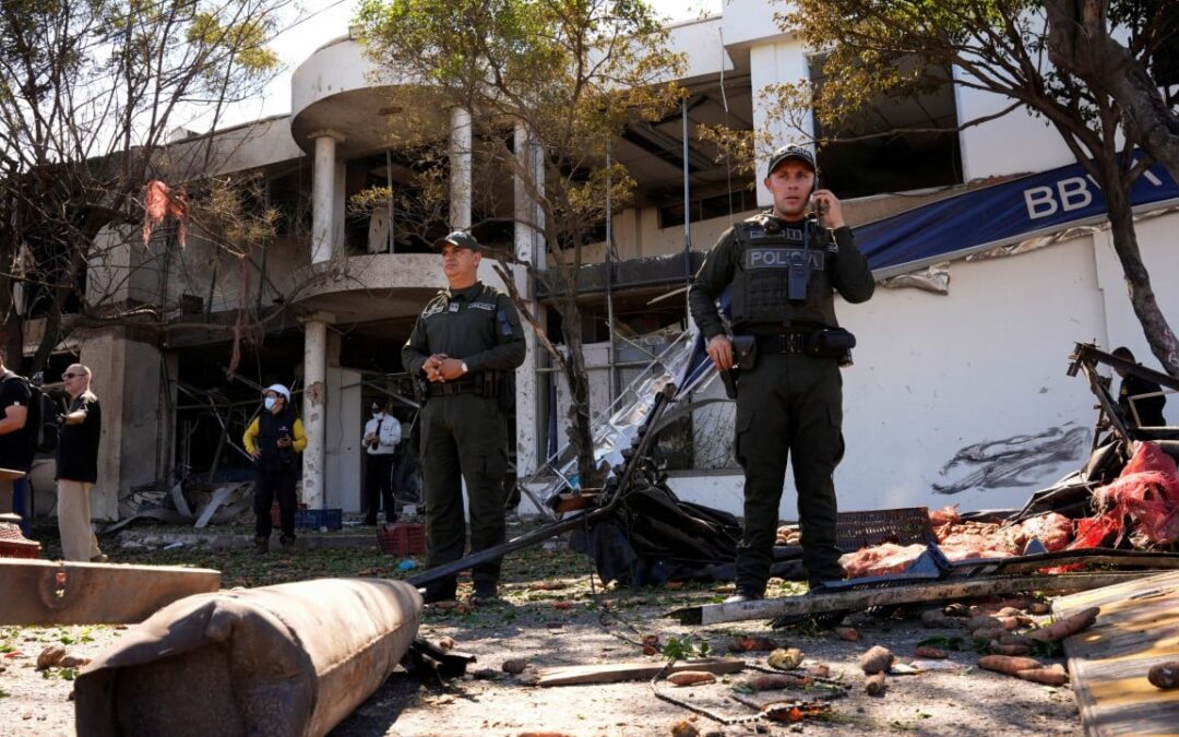 Truck explodes outside Colombia police base, injuring 11 officers and killing a dog