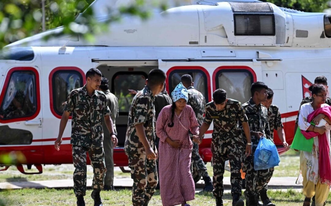 Nepal army races to rescue 100 trapped in hydropower tunnel after flash floods