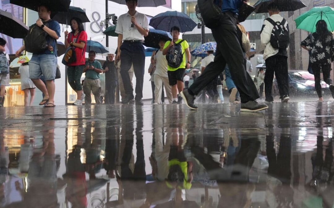 Relief after 9 blistering days as Hong Kong issues amber rainstorm warning