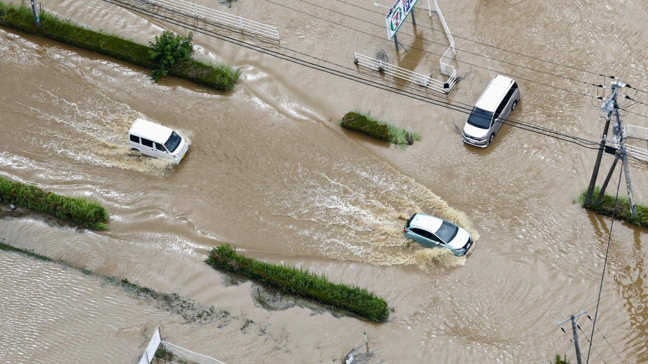 Heavy rains in Japan leave 4 dead and thousands stranded at Narita airport