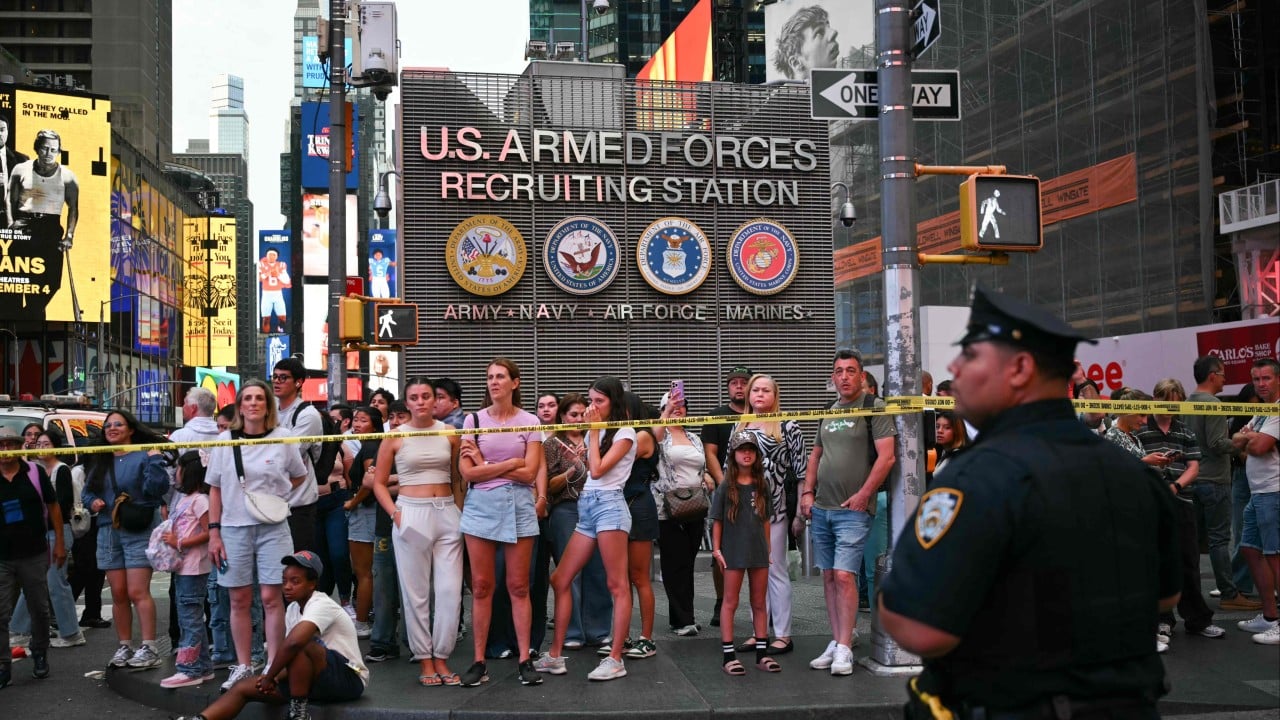 Woman waving 2 knives is shot by US police in New York’s Times Square