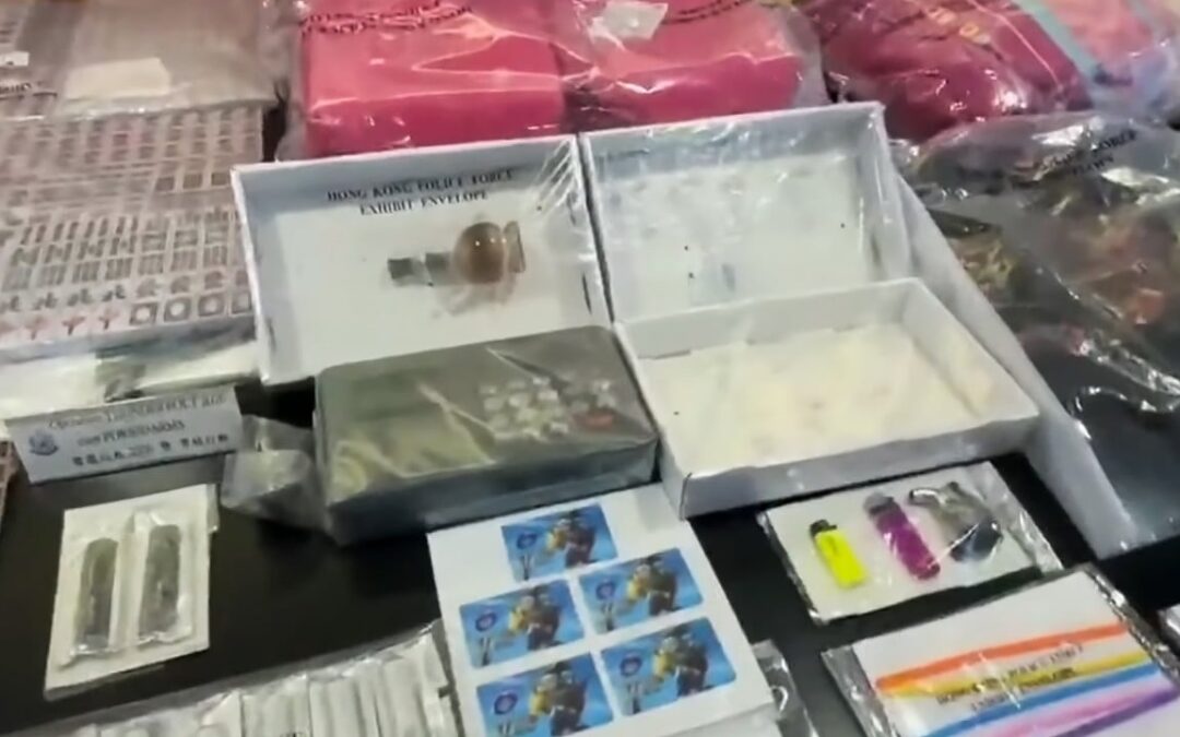 Boy, 14, among 57 arrested in crackdown on triad-linked debt collection ring