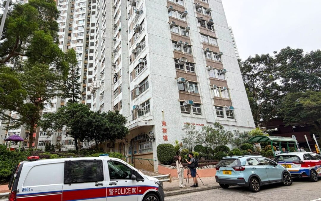 Police open investigation after 2 men found dead at Hong Kong public flat