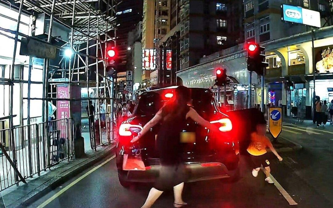 Woman arrested over child abuse in Hong Kong after dashcam video shows boy shoved