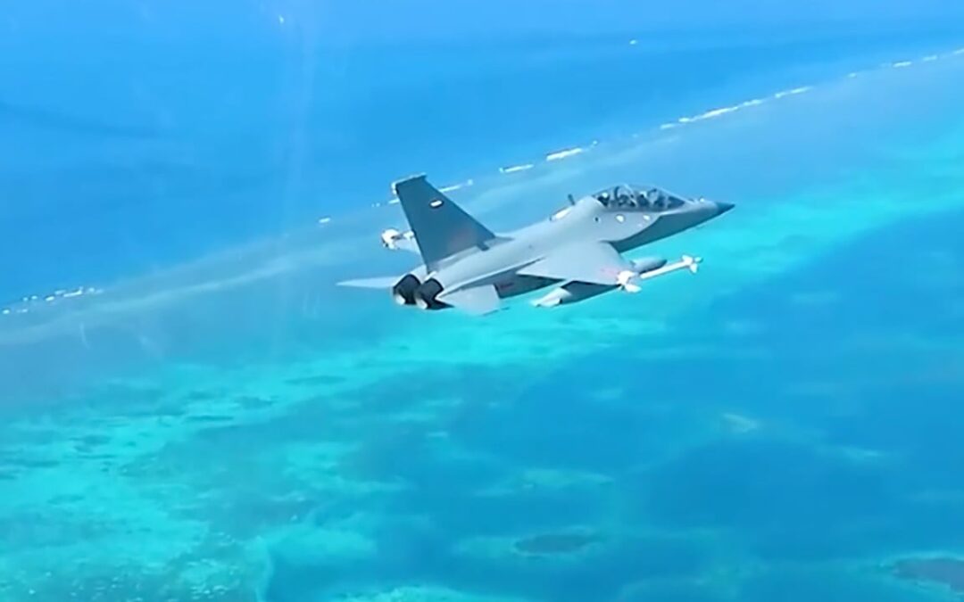 Chinese armed trainer jets drive away Philippine aircraft over Scarborough Shoal