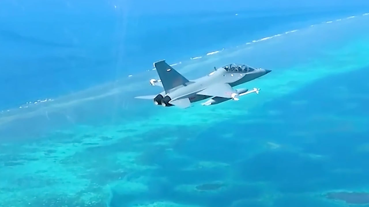 Chinese armed trainer jets drive away Philippine aircraft over Scarborough Shoal