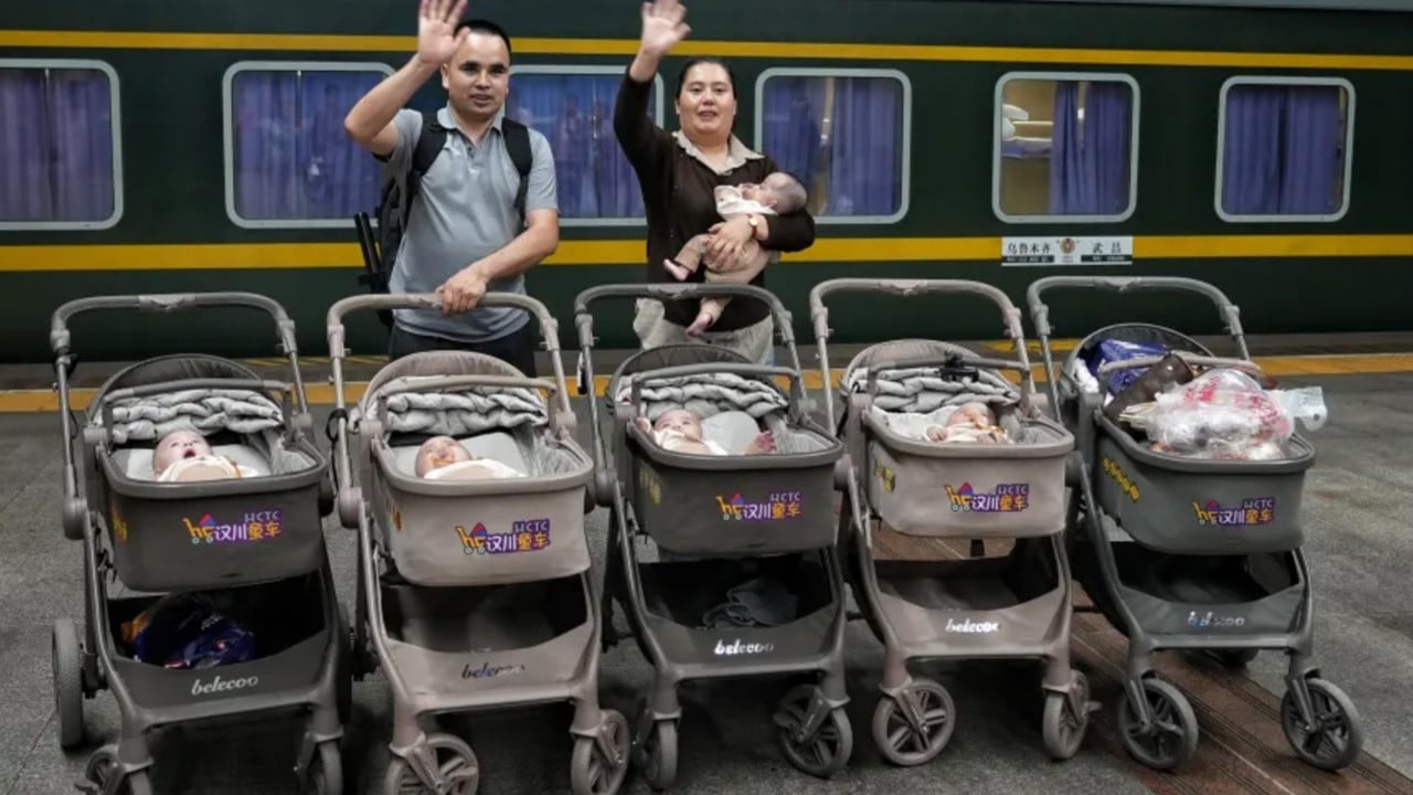 Strangers and railway staff help Chinese couple bring quintuplets home by train