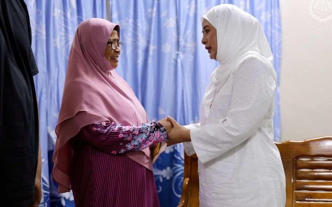 Malaysia’s queen comforts family of girl found dead at school, pledges to get justice