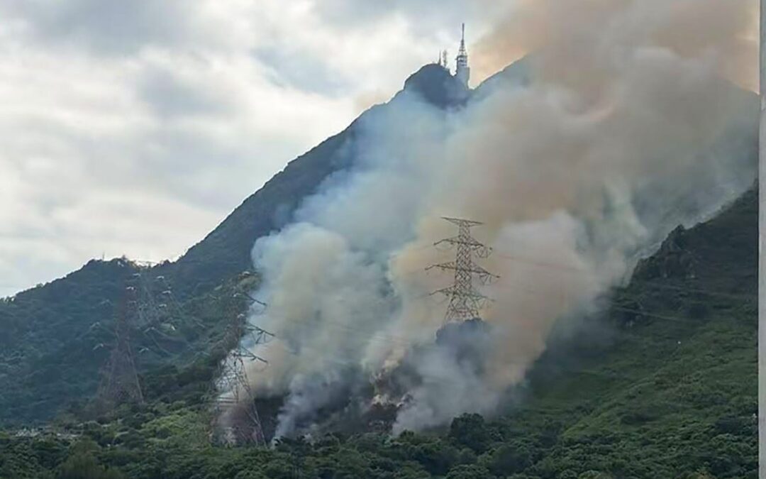 Firefighters battle hill fire near residential area in Tuen Mun