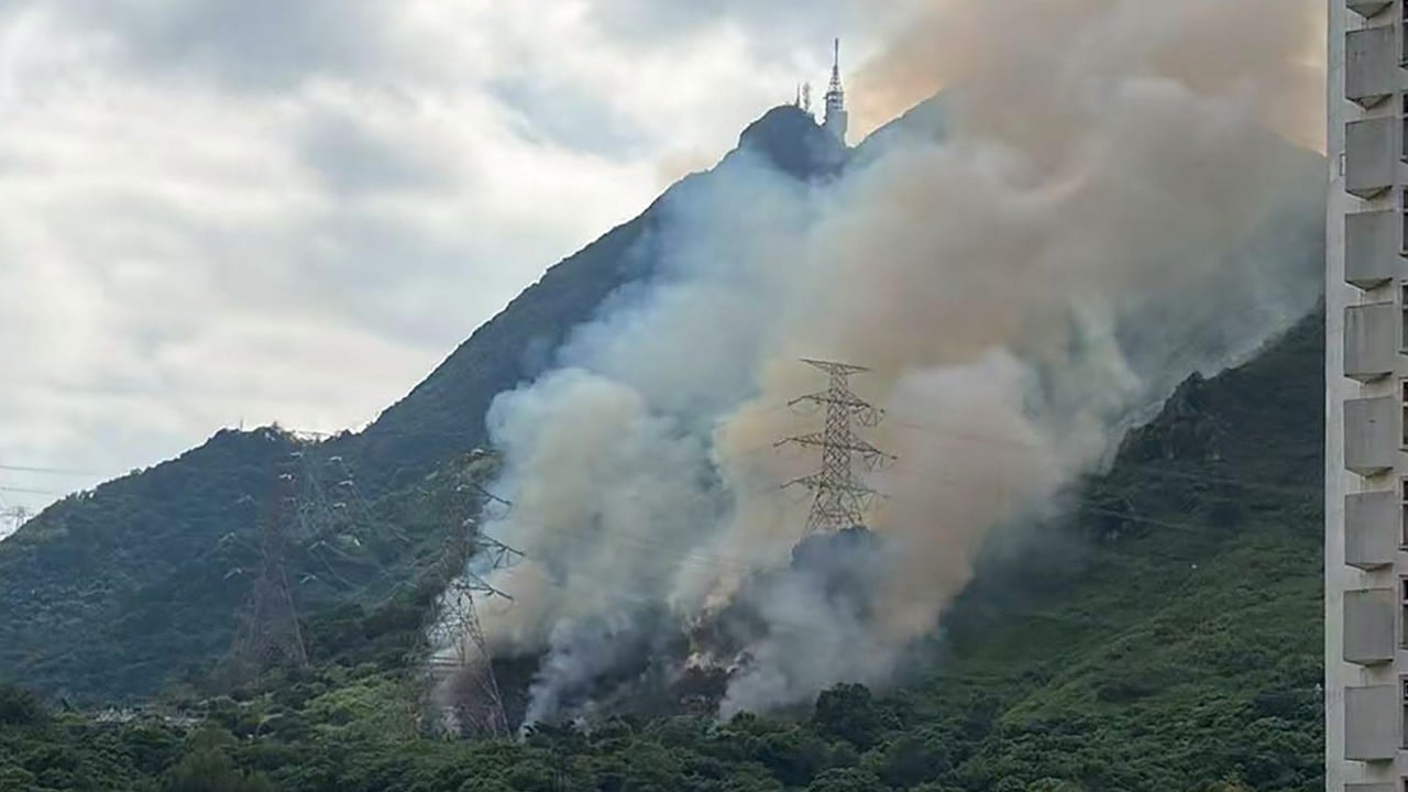 Firefighters battle hill fire near residential area in Tuen Mun